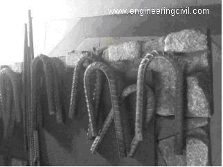 Bend pieces of rebar after test