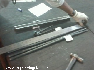 Measuring length of rebar sample