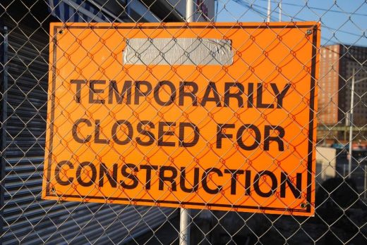 Signboard implying closed for construction work